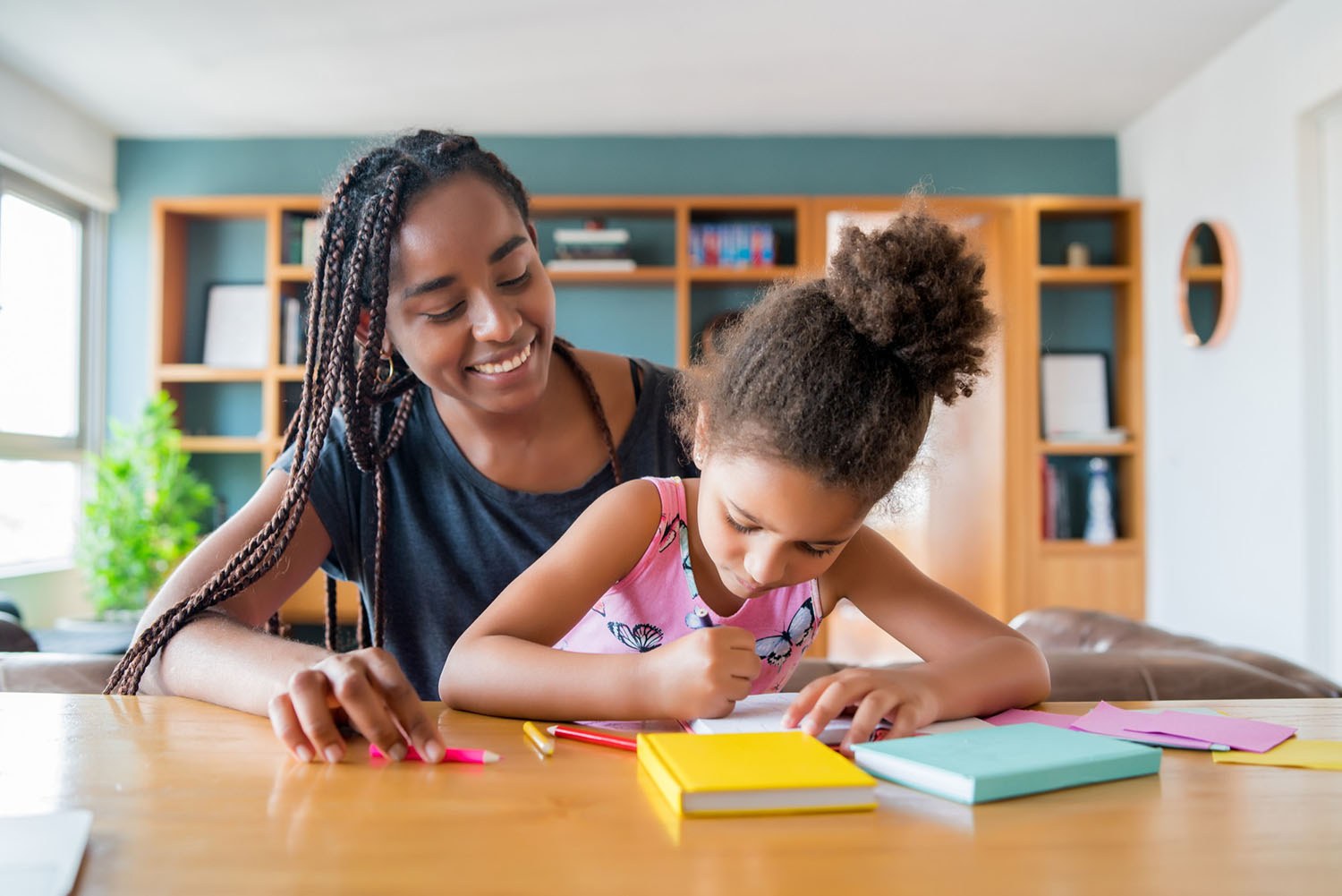 mom supporting child in homeschooling